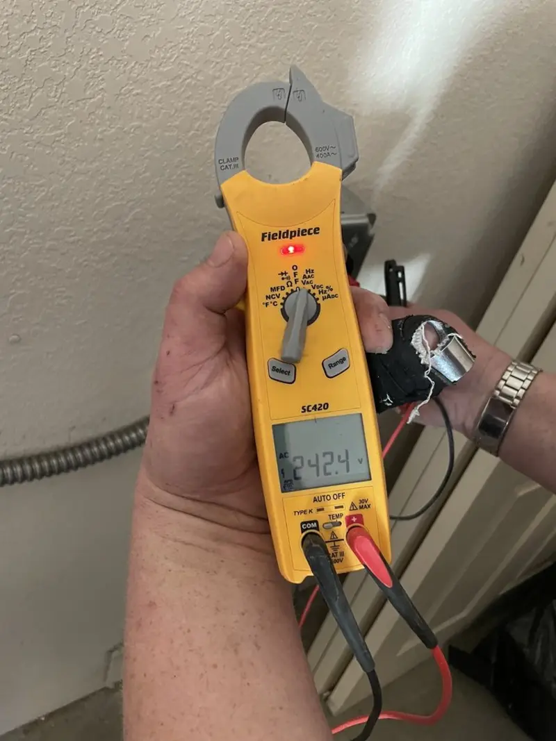 Voltage testing with clamp meter during Generator Installation in Olive
